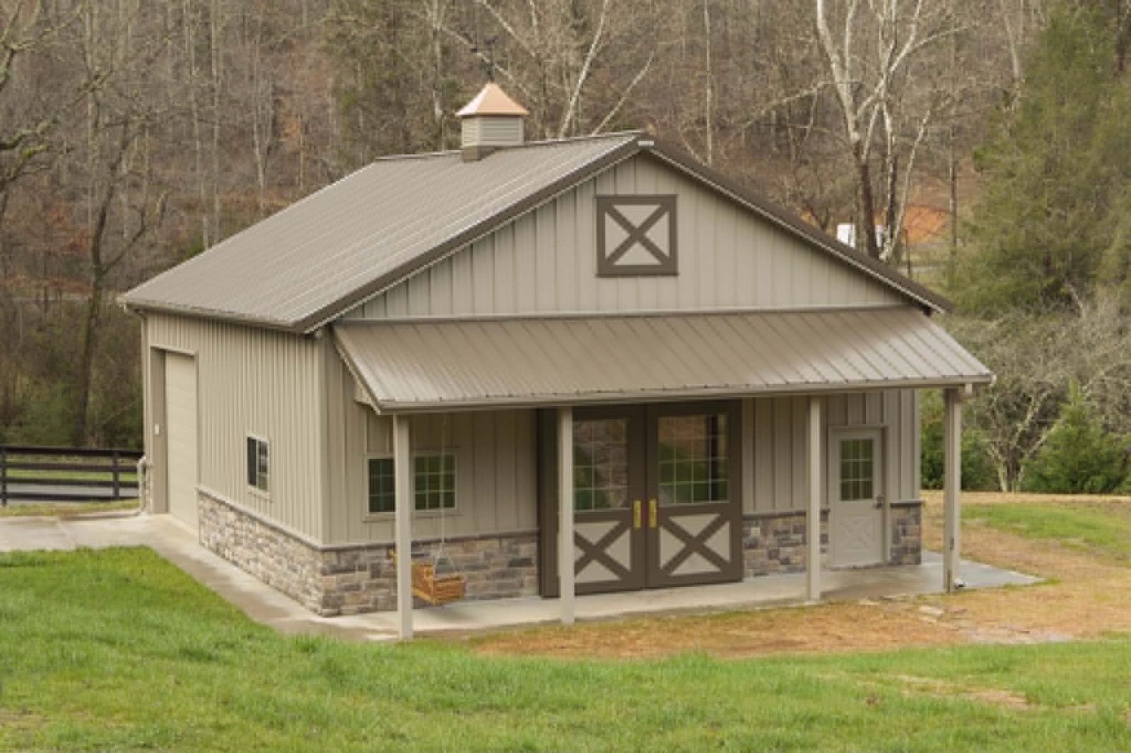 Metal barn with porch and cupola
